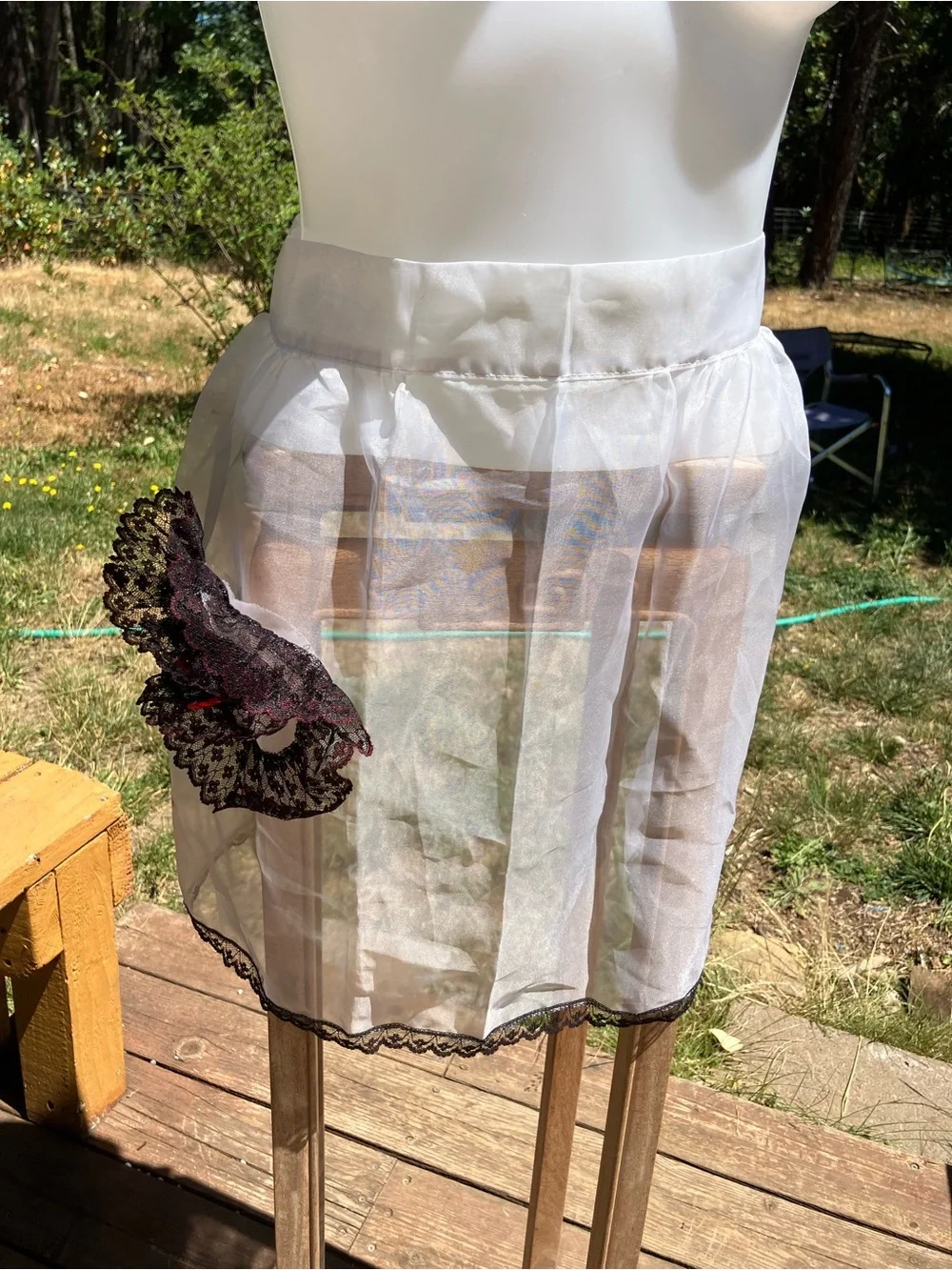 Vintage sheer apron with black and red lace pocket